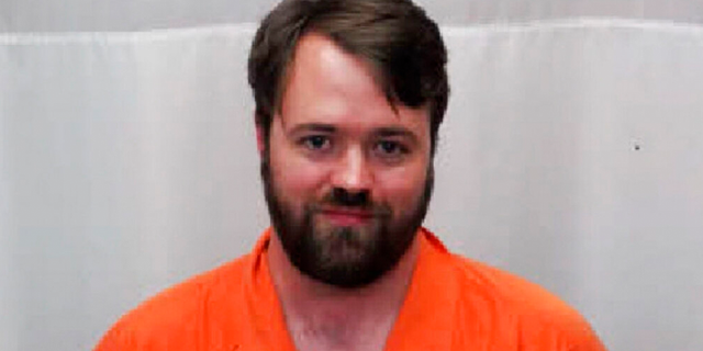 Richmond County Daily Journal News Editor Gavin Stone is shown in this undated booking photo.