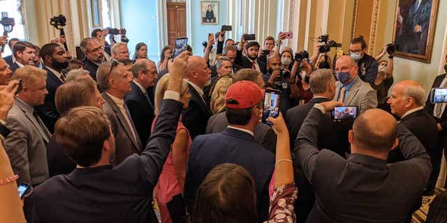 Members of Congress and Republican staff protest the new mask mandate in the House chamber on July 29, 2021. 