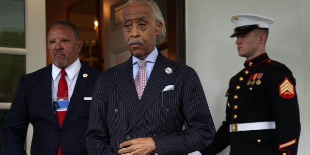 Civil rights leaders Marc Morial (left) of National Urban League and the Rev. Al Sharpton (center) of National Action Network emerge from the West Wing of the White House to hold a news briefing after a meeting with President Biden and Vice President Kamala Harris, July 8, 2021, in Washington.