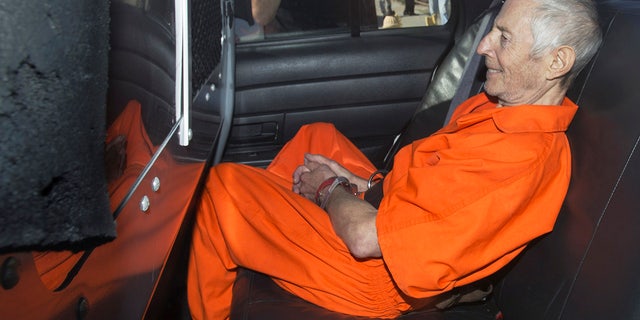 Robert Durst sits in a police vehicle as he exits a courthouse in New Orleans, Louisiana, March 17, 2015. (REUTERS / Lee Celano)