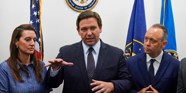 Florida Gov. Ron DeSantis, center, speaks during a news conference at the offices of Rep. Maria Elvira Salazar, R-Fla., alongside Lt. Gov. Jeanette Nunez, left, and Marcell Felipe, right, founder of the Inspire America Foundation, an organization dedicated to promoting democracy in Cuba and the Americas, Thursday, July 15, 2021, in Miami.