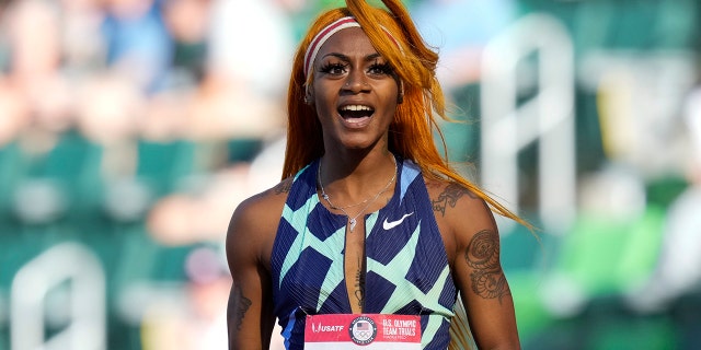 In this June 19, 2021 photo, Sha'Carri Richardson celebrates after winning the first heat of the semifinals in the women's 100 meter dash at the US Track and Field Olympic Trials in Eugene, Oregon.