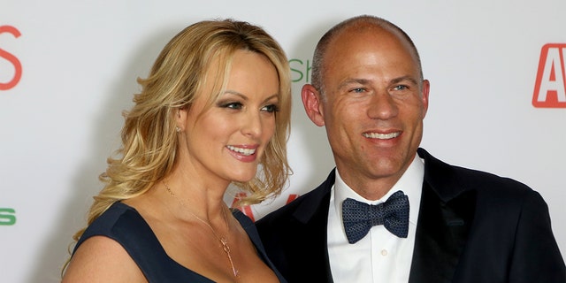 Adult film actress/director Stormy Daniels and attorney Michael Avenatti attend the 2019 Adult Video News Awards at The Joint inside the Hard Rock Hotel and Casino in Las Vegas on Jan. 26, 2019.