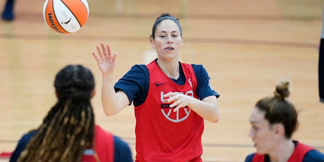 Sue Bird passes during practice for the United States women's basketball team in preparation for the Olympics, Tuesday, July 13, 2021, in Las Vegas. (AP Photo/John Locher)
