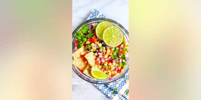 This recipe, from Planted in the Kitchen’s Kelsey Riley, is a healthy -- but still delicious -- corn dip option.