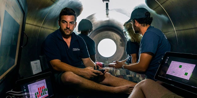 This undated photo provided by OceanGate Expeditions in June 2021 shows the interior of company's Titan submersible. The undersea exploration company plans to dive to the sunken Titanic as early as Wednesday, June 30, 2021, to begin what’s expected to be an annual chronicling of the shipwreck’s ongoing deterioration. (OceanGate Expeditions via AP)