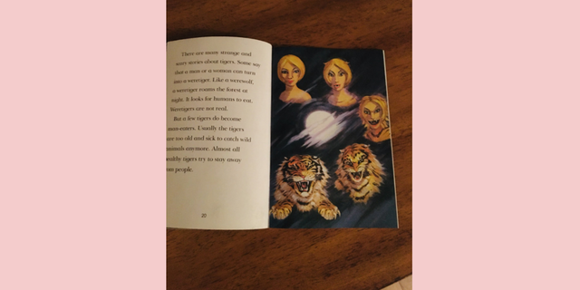 A book showing a killer tiger formed by a white woman. 
