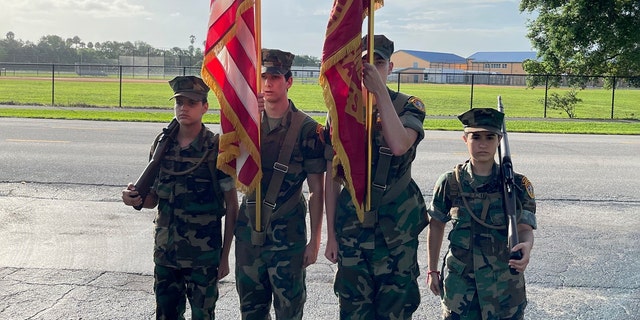 The Young Marines of the Palm Beaches celebrating Peter V. Ruvolo's birthday. 