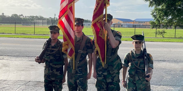 The Young Marines of the Palm Beaches celebrating Peter V. Ruvolo's birthday.