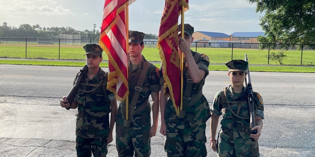 The Young Marines of the Palm Beaches celebrating Peter V. Ruvolo's birthday. 