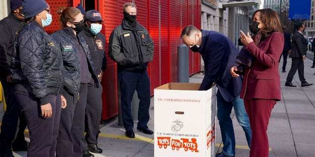 Vice President Kamala Harris and her husband, Douglas Emhoff, drop off gifts for Toys for Tots.