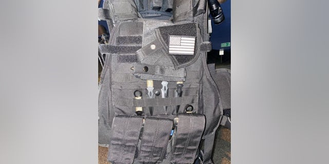 Officers found body armor and other weapons inside Wesley Martines' truck along with a journal with racist writing, prosecutors said.