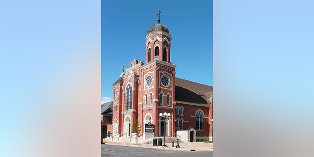 This June 2, 2021, photo provided by Marilyn J. Richmond shows St. James the Less parish in La Crosse, Wis. The Diocese of La Crosse said Friday, July 9, that Bishop William Patrick Callahan has removed the Rev. James Altman as pastor of St. James the Less effective immediately.