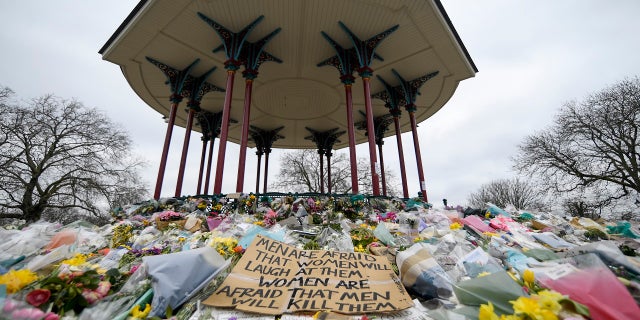 Floral tributes and messages are placed at the bandstand at Clapham Common in London in memory of Sarah Everard in March. (PA)