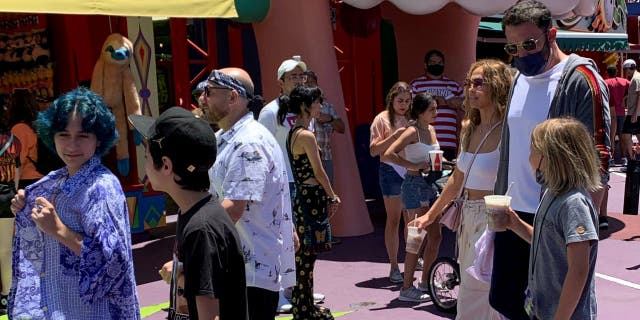 Jennifer Lopez and Ben Affleck went to Universal Studios Hollywood with their children on Friday, July 2, 2021. Lopez's twins Max and Emma, 13, and Affleck's son Samuel, 9 were present during the family trip. (Credit: SWNS)