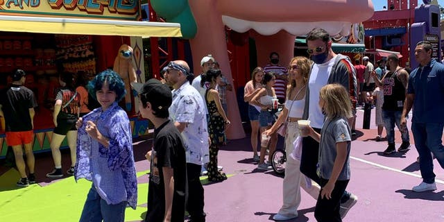 Jennifer Lopez and Ben Affleck went to Universal Studios Hollywood with their children on Friday, July 2, 2021. Lopez's twins Max and Emma, 13, and Affleck's son Samuel, 9 were present during the family trip. (Credit: SWNS)