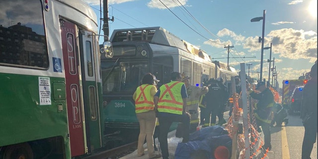 A collision between two Boston trains Friday evening left at least 25 people with non-life-threatening injuries, authorities said. 