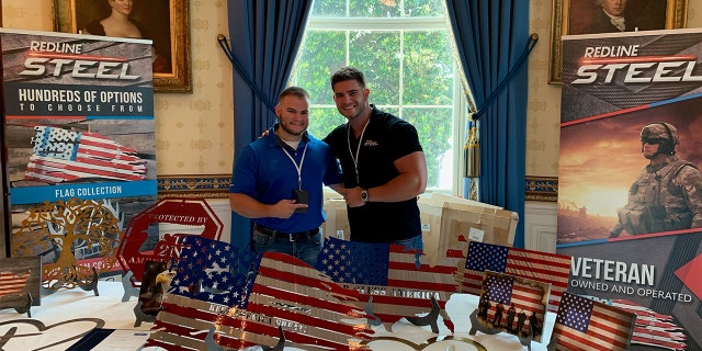 Colin Wayne, an Army combat veteran and CEO of Redline Steel in Alabama, on the right, with his brother, Coleman Erwin (L), an Army veteran. The picture was taken on July 15, 2019, at the White House when Redline Steel was invited to be part of the "Made in America" business showcase.
