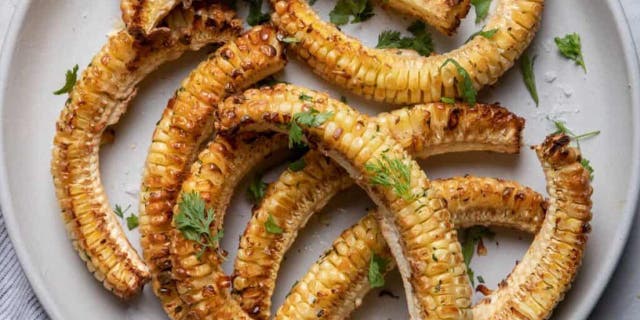 Feel Good Foodie credited fellow TikTok creator Farrah J (AKA Spiced Nice) for making the corn rib trend go viral on the app earlier this year.