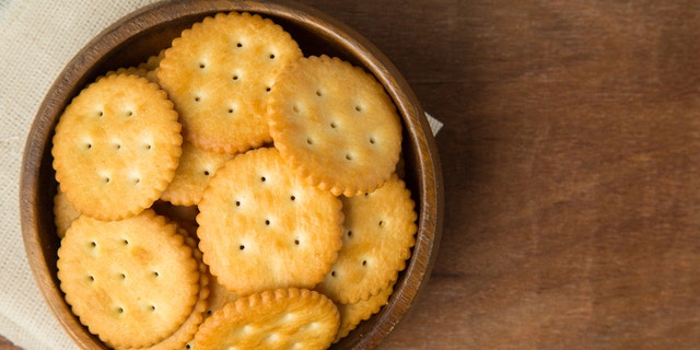 Ritz Crackers recently posted a video on TikTok giving a brief explanation for the scalloped edges on its classic snack, saying the design is to help fans slice cheese.
