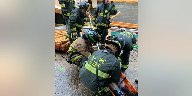 One person was trapped in the rubble for roughly an hour and a half, but firefighters were communicating with him and able to rescue him at about 5 p.m. (DC Fire and EMS)