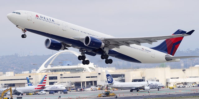 A Delta Air Lines Airbus takes off from Los Angeles International Airport.