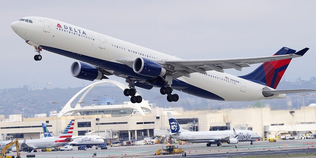 A Delta Air Lines Airbus takes off from Los Angeles International Airport. 