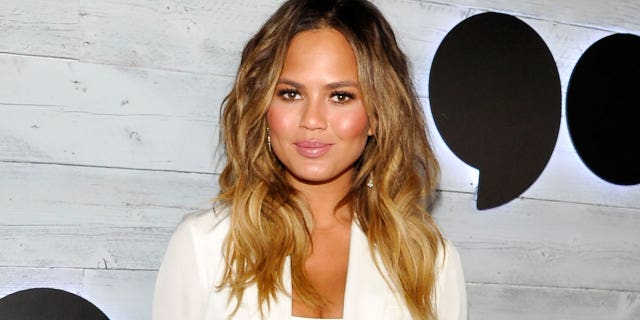 Chrissy Teigen is receiving backlash for posting about her recent eyebrow transplant procedure.