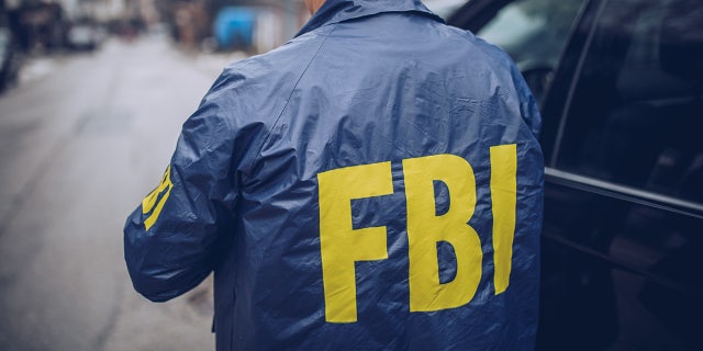 FBI agent wearing a FBI jacket