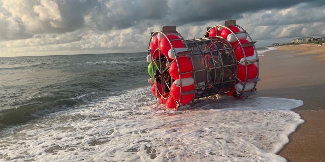 The sole occupant of the bubble-like vessel was found safe after washing ashore Saturday, authorities said.