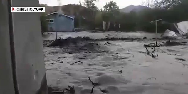 Globe resident Chris Holyoak captured the flash flood on his cellphone, sharing his footage with Fox News, showing the scary moments when a wall of water was barreling straight toward him. (Chris Holyoak)