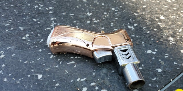 The suspect was later found to have a replica weapon, according to police. (Los Angeles Police Department)