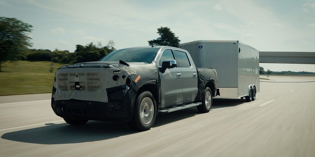 The 2022 GMC Sierra pickup, like this prototype, will offer hands-free towing capability with Super Cruise.
