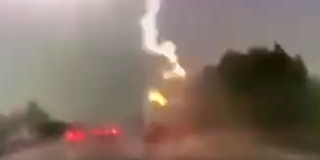 Lightning strikes truck in shocking video — Here's why the driver survived