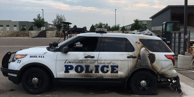 The police vehicle was unoccupied at the time it was set ablaze in Colorado. 