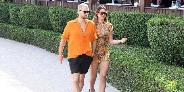 Scott Disick and Amelia Hamlin will be seen walking on the beach in Miami on April 7, 2021. 