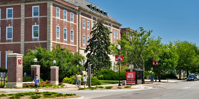 Lincoln, Nebraska, USA - July 9, 2013: Street side view of people at the campus of the University of Nebraska in downtown Lincoln.