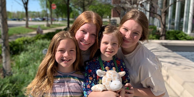 Vera pictured with her siblings above. 