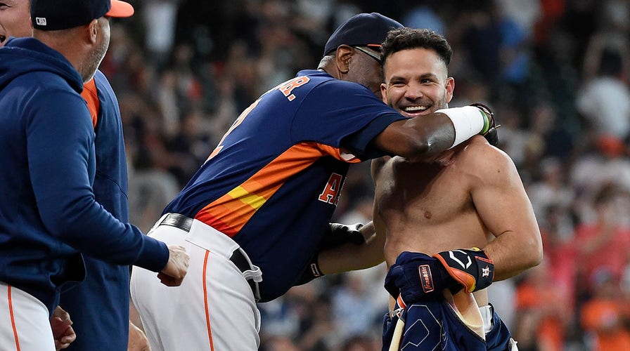 Astros' Jose Altuve gets jersey ripped off after game-winning