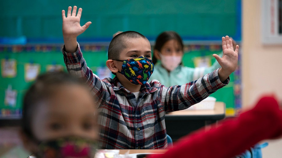 A kindergardener in a mask