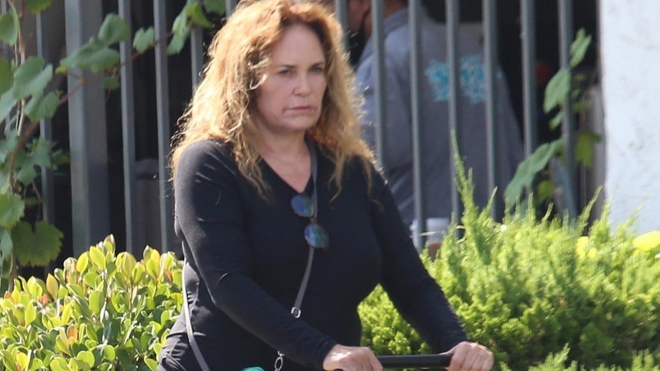 ‘Dukes of Hazzard’ star Catherine Bach enjoys a stroll with her ‘puppies’ in Los Angeles
