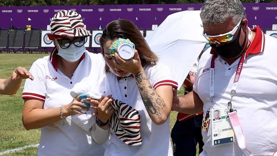 Russian archer Svetlana Gomboeva suffers sunstroke during Olympic event