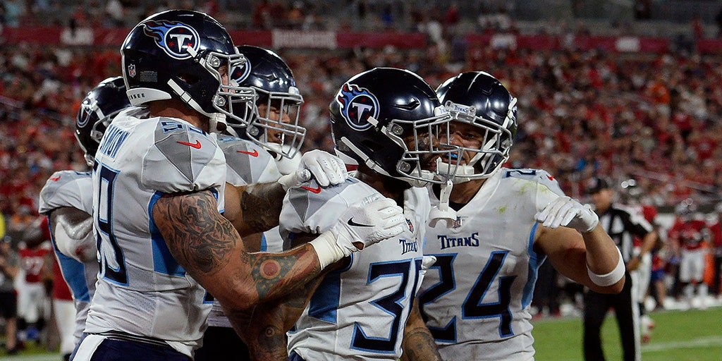 Titans' defence shuts down Brady-less Buccaneers