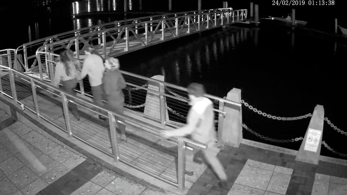 Surveillance video shows Paul Murdaugh (right) walking to his father’s boat in downtown Beaufort shortly before he allegedly crashed a boat near Parris Island. S.C. Department of Natural Resources/Provided
