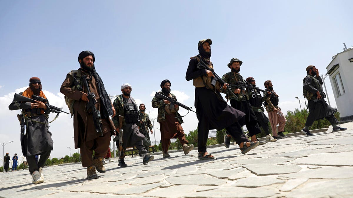 Taliban fighters patrol Kabul