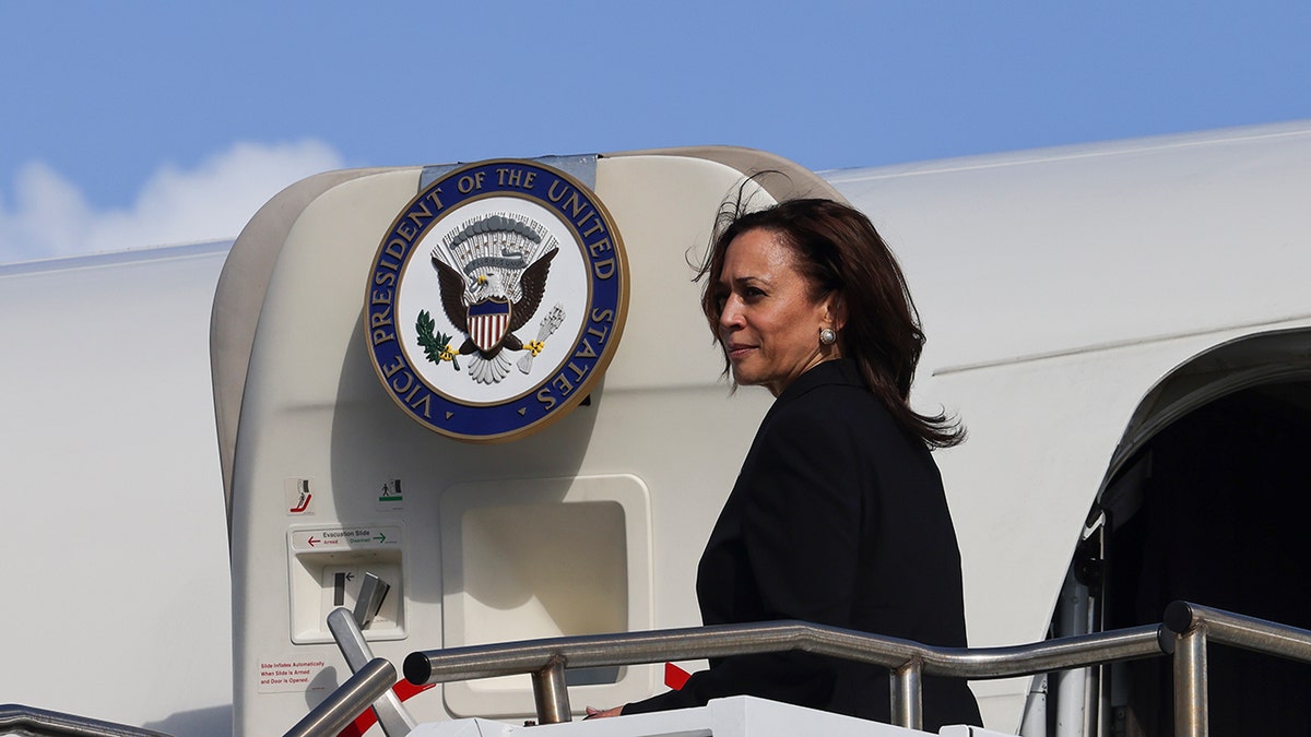 U.S. Vice President Kamala Harris boards Air Force Two to return to Washington from Joint Base Pearl Harbor-Hickam, Hawaii, Thursday, Aug. 26, 2021. (Associated Press)