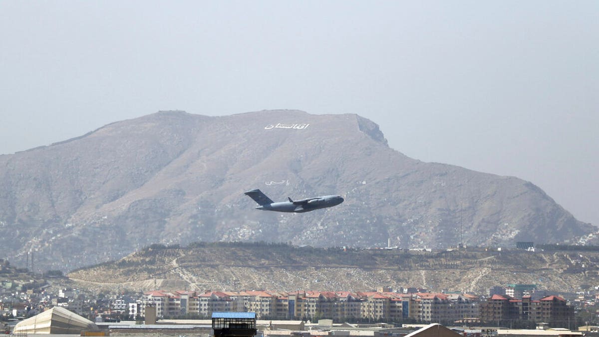 U.S military aircraft takes off at the Hamid Karzai International Airport in Kabul, Afghanistan, Saturday, Aug. 28, 2021. The massive U.S.-led airlift was winding down Saturday ahead of a U.S. deadline to withdraw from Afghanistan by Tuesday. Most allies have completed their own airlifts and flown out after 20 years of deployment in the country. (AP Photo/Wali Sabawoon)