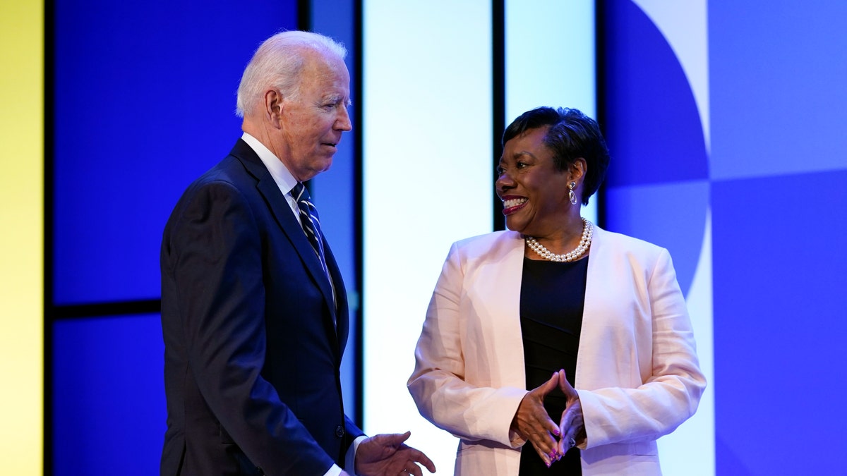 President Biden speaks with National Education Association President Becky Pringle at the NEA's annual meeting at the Walter E. Washington Convention Center in Washington, Friday, July 2, 2021.