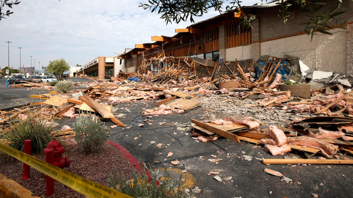 A view of a La Bonita supermarket after the storefront collapsed in Las Vegas, Friday, Aug. 13, 2021. Authorities say several people were treated for unspecified minor injuries after the storefront collapse at the supermarket. (Steve Marcus/Las Vegas Sun via AP)