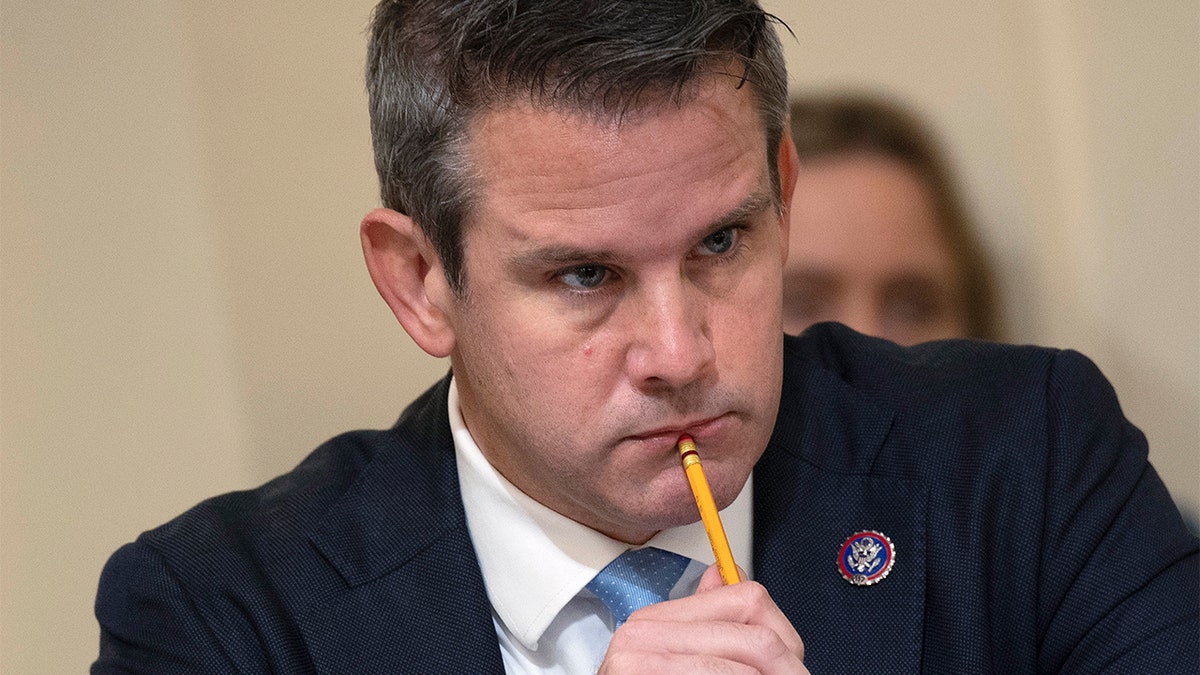 Rep. Adam Kinzinger, R-Ill., listens during the House select committee hearing on the Jan. 6 attack on Capitol Hill in Washington, Tuesday, July 27, 2021. (Brendan Smialowski/Pool via AP)